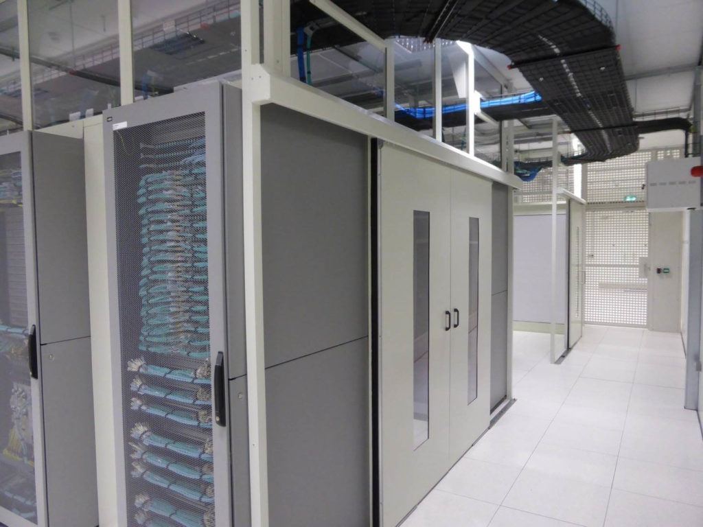 Hot aisle containment installed between rows of server cabinets