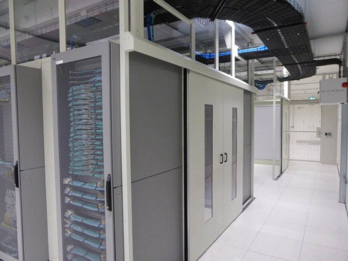 Hot aisle containment installed between rows of server cabinets